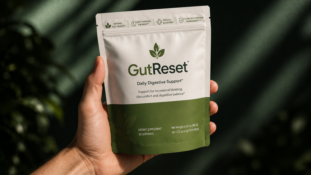 Hand holding GutReset pouch